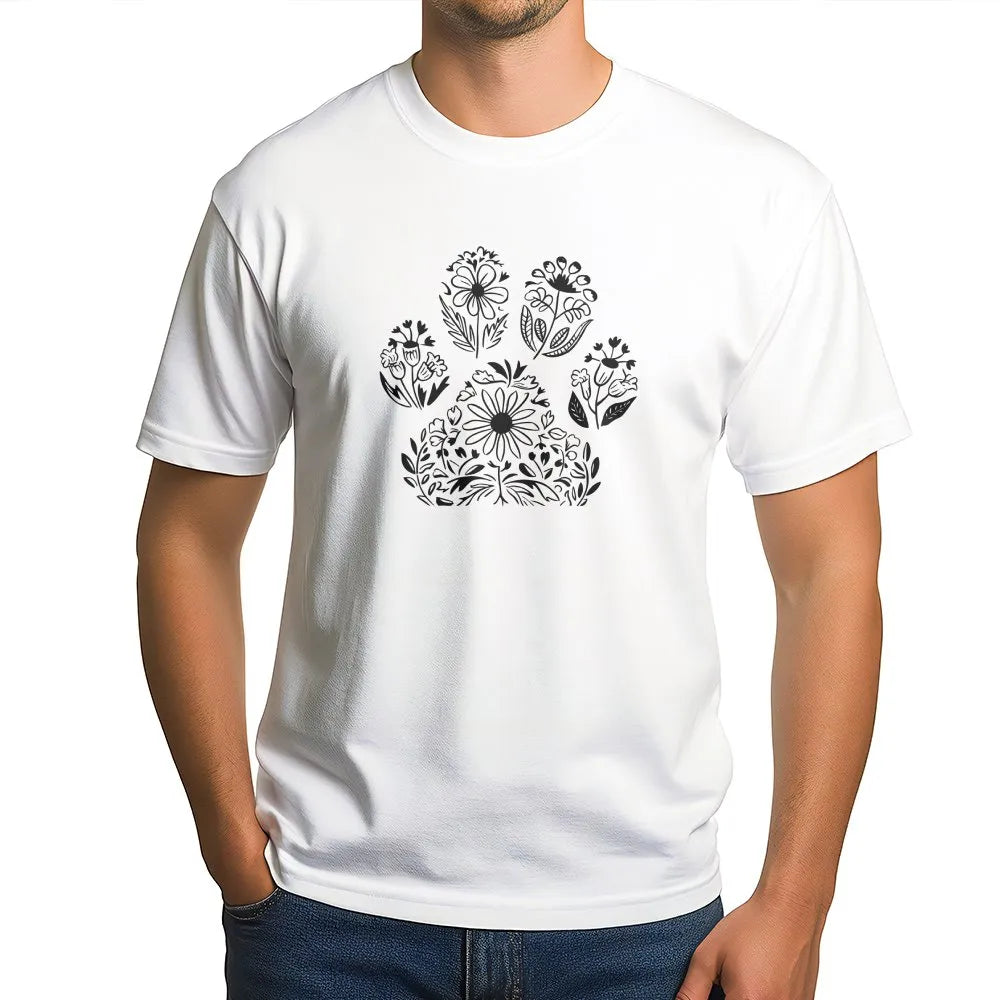 Man wearing a white unisex cotton t-shirt with a botanical floral dog paw print