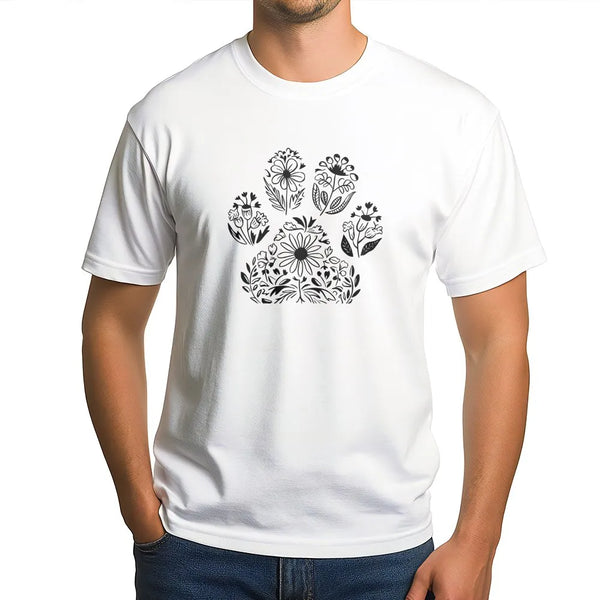 Man wearing a white unisex cotton t-shirt with a botanical floral dog paw print