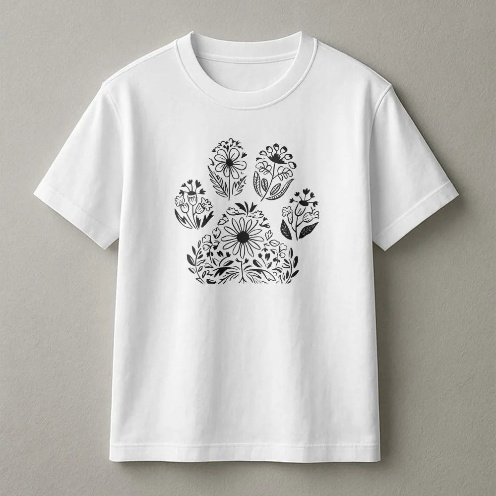 Front view of a white botanical floral dog paw t-shirt