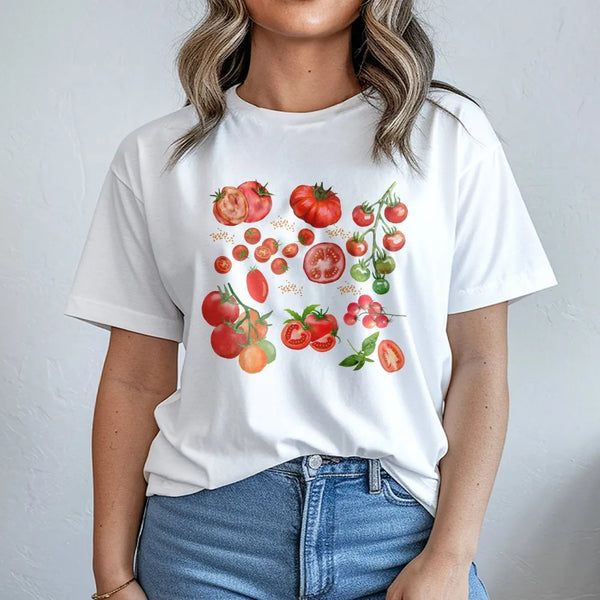 Model wearing a white t-shirt with a vintage tomato botanical print