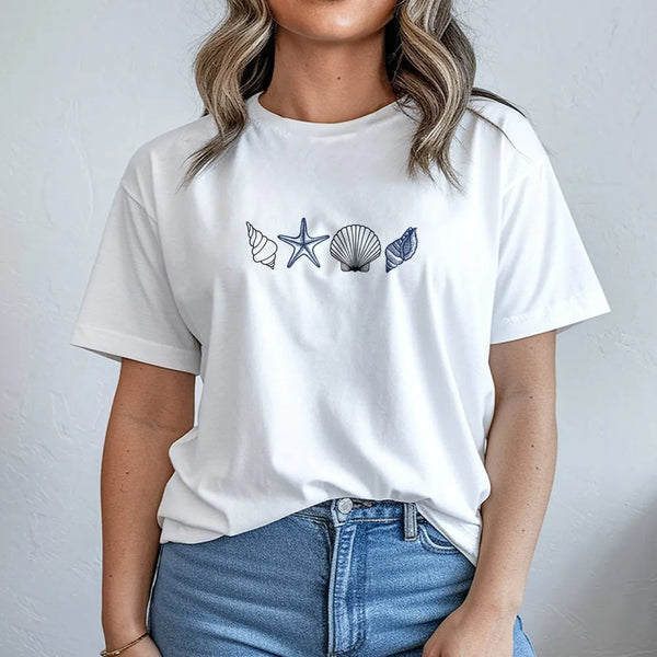Model wearing a white t-shirt with a minimalist seashell print