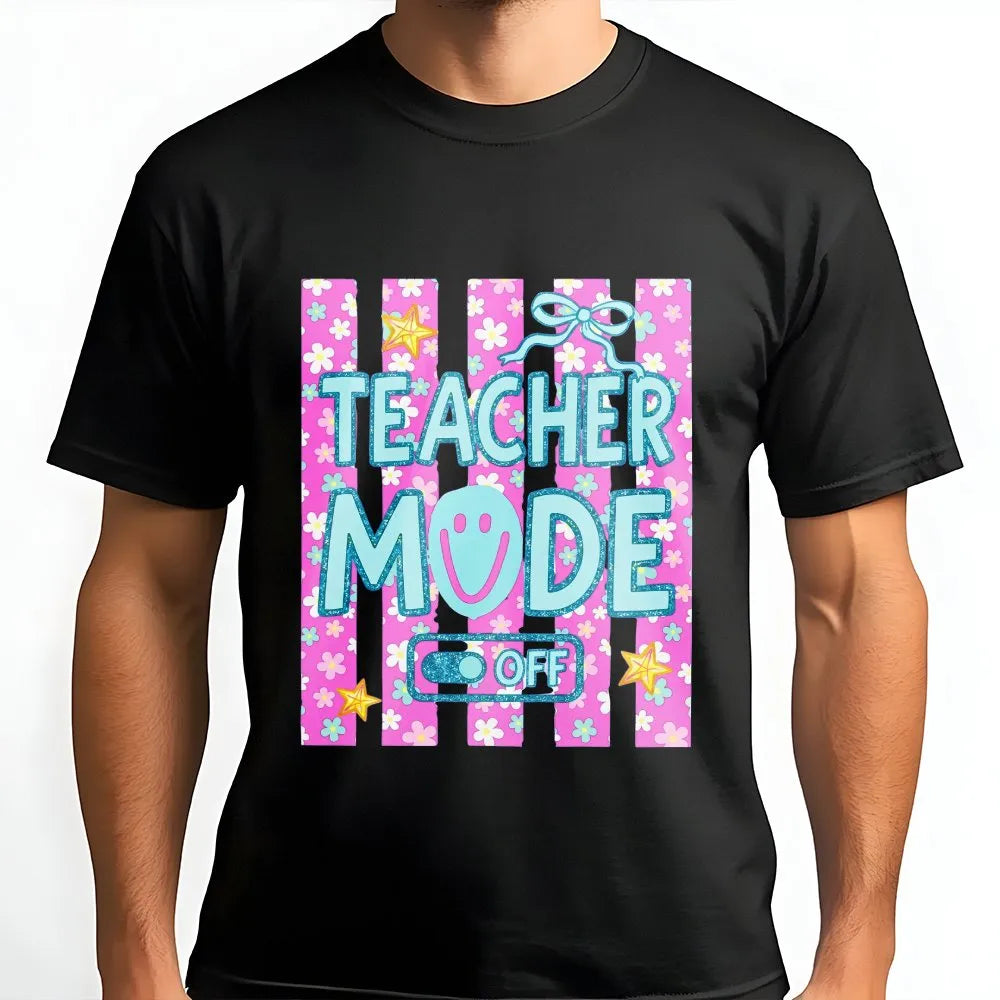 Model wearing a black t-shirt with a Teacher Mode Off floral print