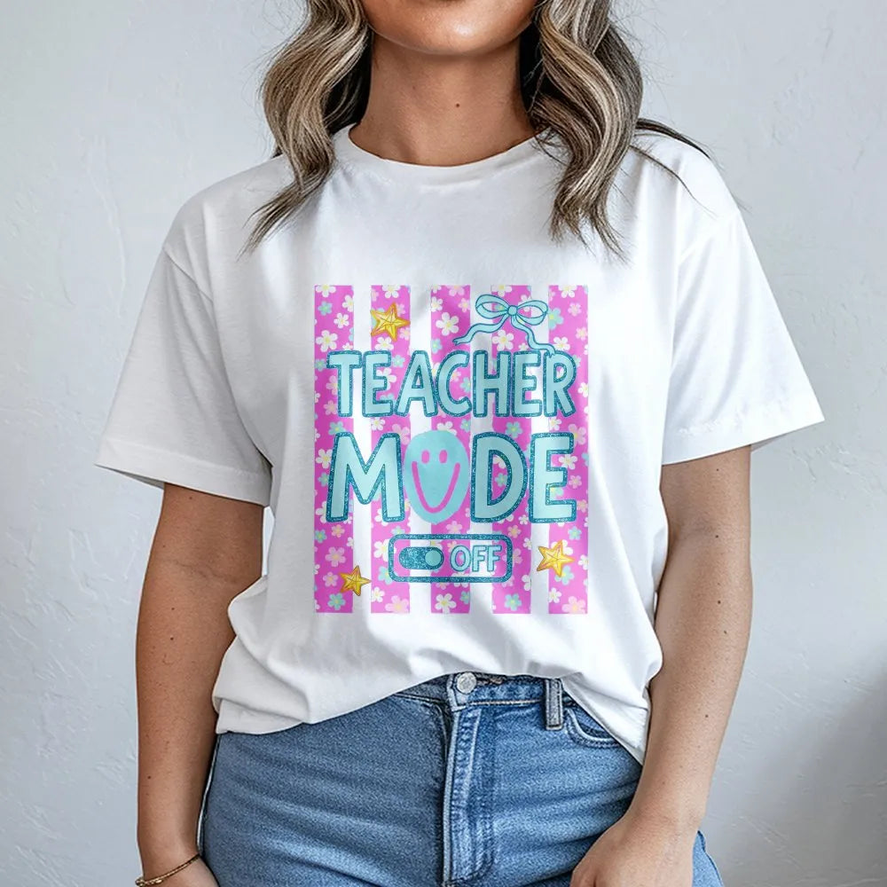 Model wearing a white t-shirt with a Teacher Mode Off floral print