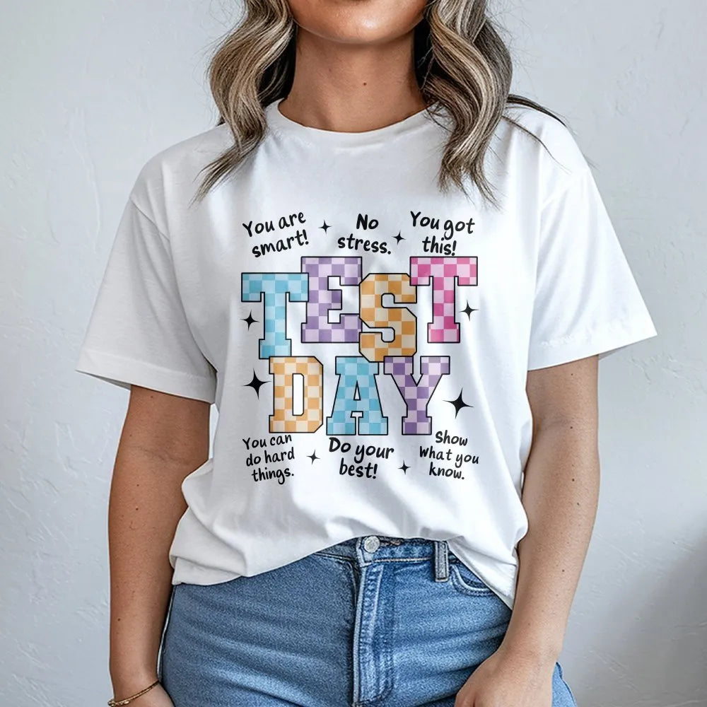 Model wearing a white Test Day retro motivational t-shirt